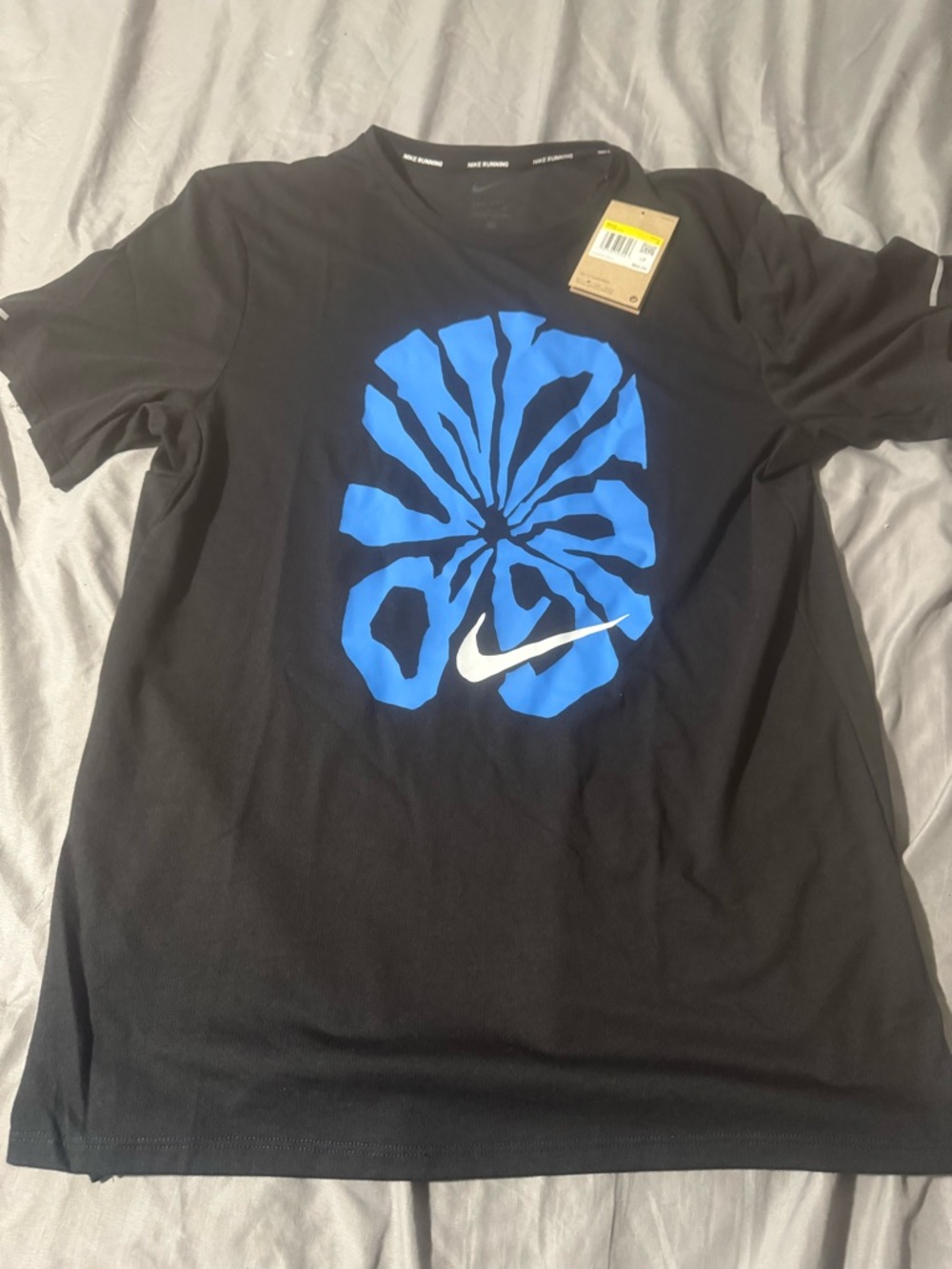 Nike Men’s Black Short-Sleeve Tee with Blue Graphic and White Swoosh